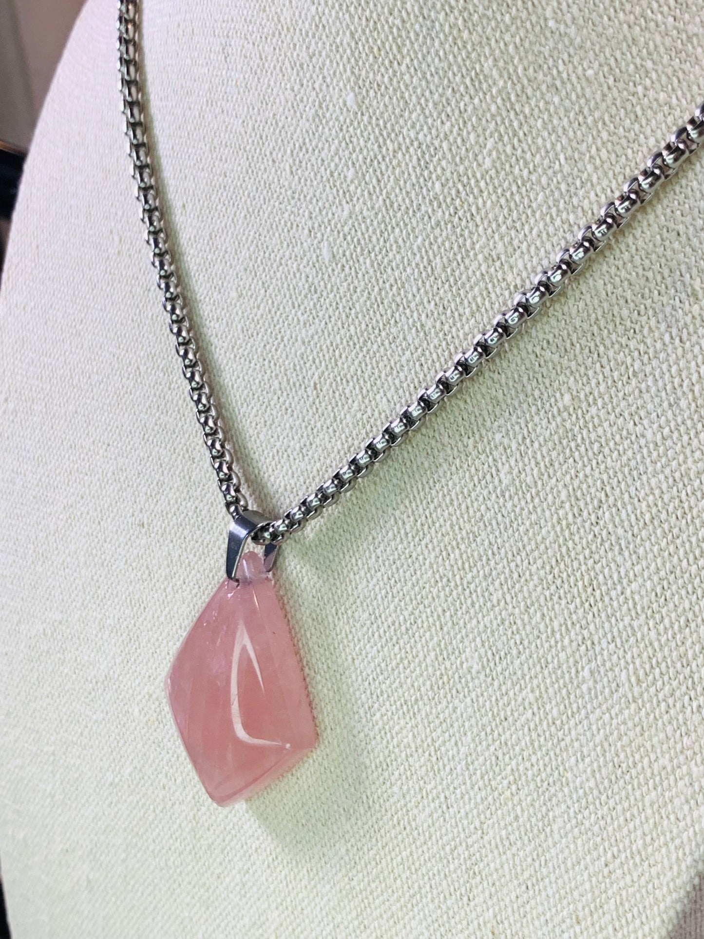 Natural rose quartz with 316 surgical steel necklace. Tarnish and water resistant.