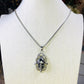 Necklace and pendant made of 316 surgical steel. Tarnish and water resistant.
