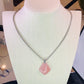 Natural Rose Quartz crystal pendant for love and self-love.